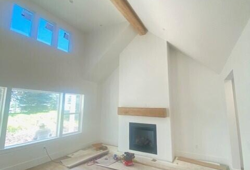 Great room beam and fireplace