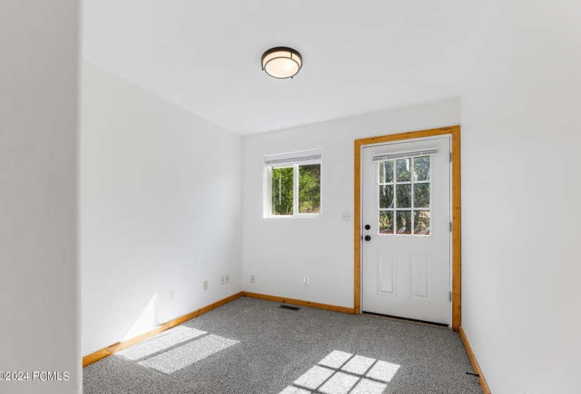 main level bedroom with back deck access