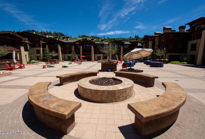 common area plaza fire pit summer scene