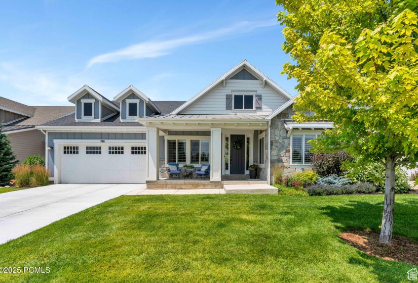 View of front of property with a garage